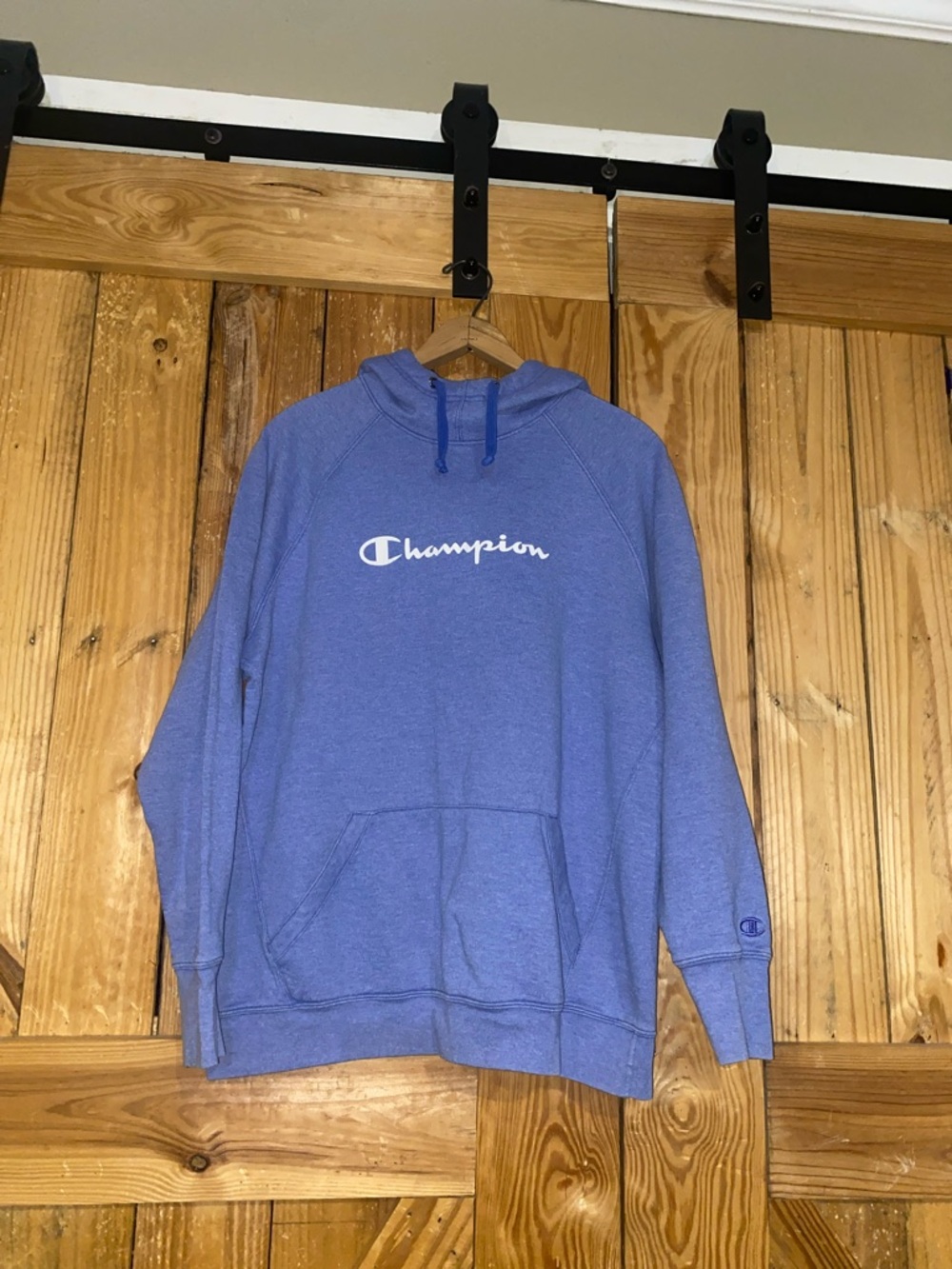 Champion Unisex light blue Hoodie with Script Logo